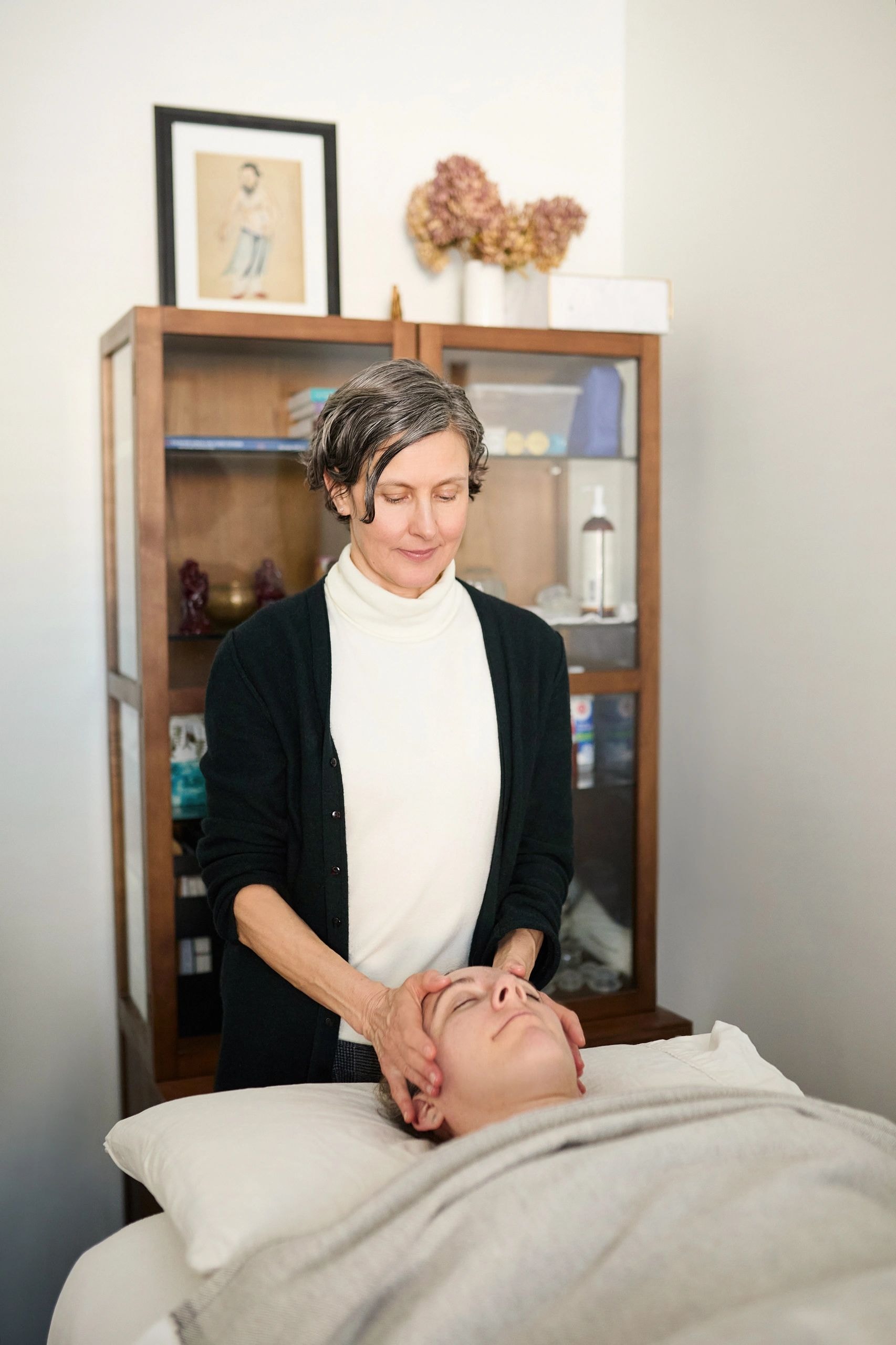Carlyn performing massage therapy